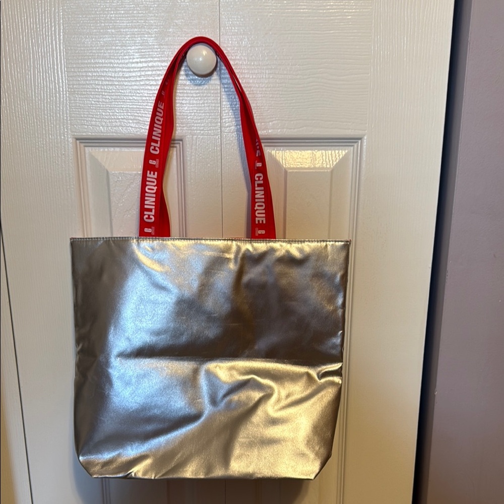 Clinique Silver and Red Metallic Tote Bag